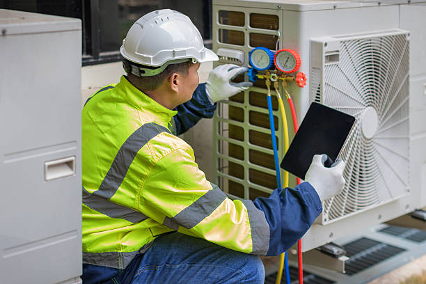 Professional Hvac technician working in Brookline Village, MA
